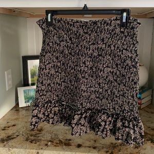 Smocked flower mini skirt